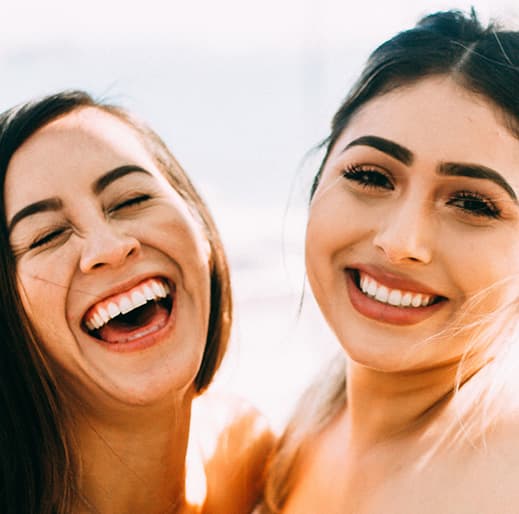 two women smiling